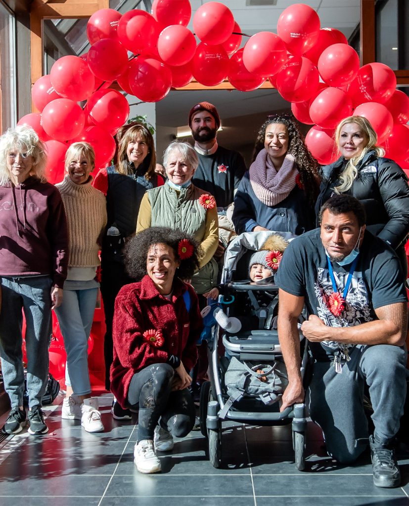 Photo of a group of participants at a Myeloma Canada Multiple Myeloma March in Montreal, QC in front of a red balloon arch.